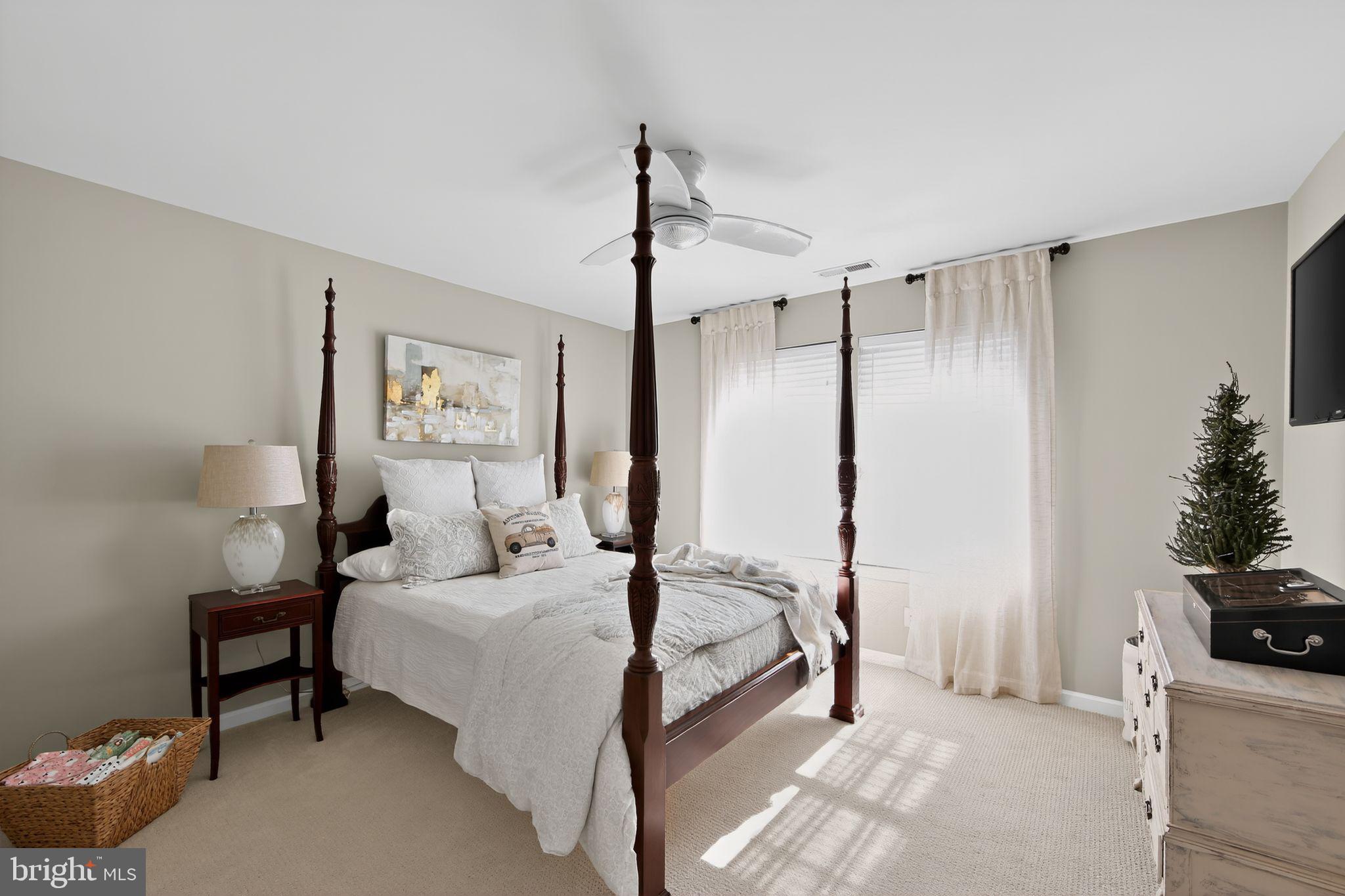 618 Kent Court Chester Springs, PA 19425 - Photo 24 of 34 a bedroom with a bed and a chandelier