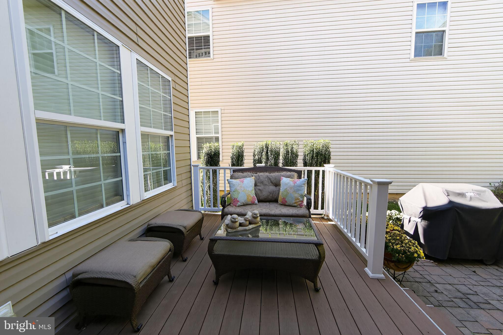 618 Kent Court Chester Springs, PA 19425 - Photo 30 of 34 a balcony with wooden floor and furniture