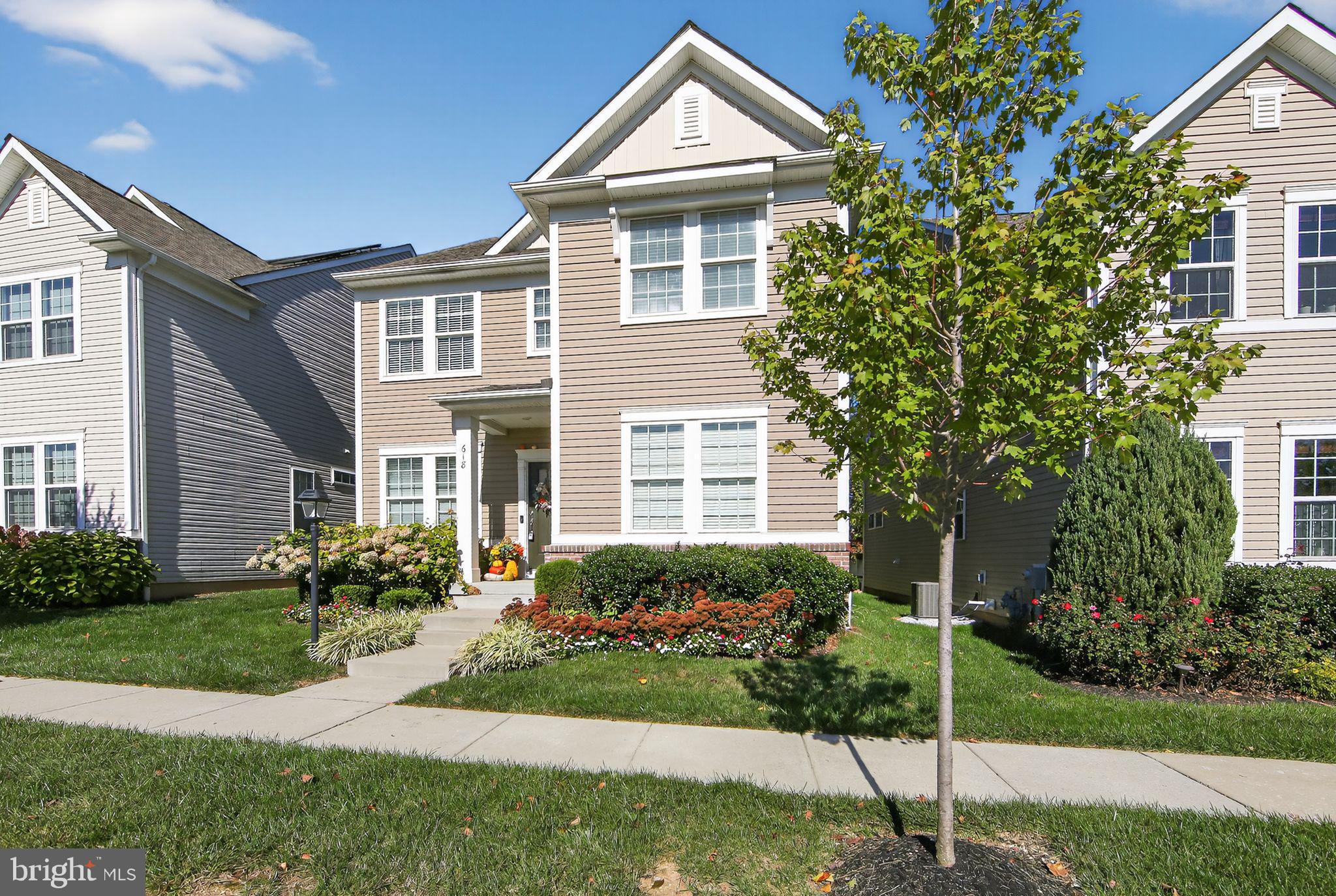 618 Kent Court Chester Springs, PA 19425 - Photo 3 of 34 a front view of a house with a yard and trees