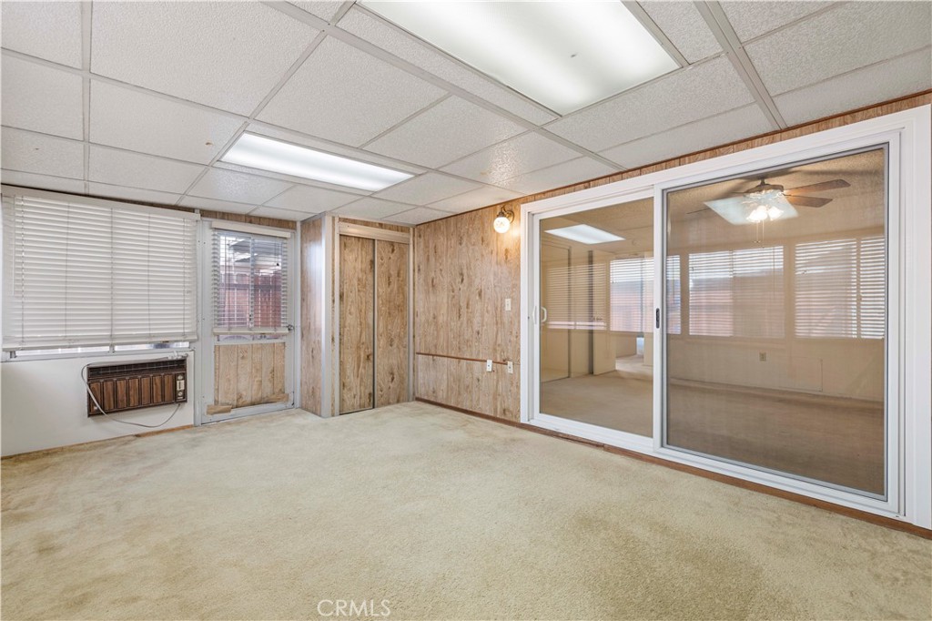 26838 C Ave Of The Oaks, Unit C Newhall, CA 91321 - Photo 14 of 34 a view of an empty room with a fireplace