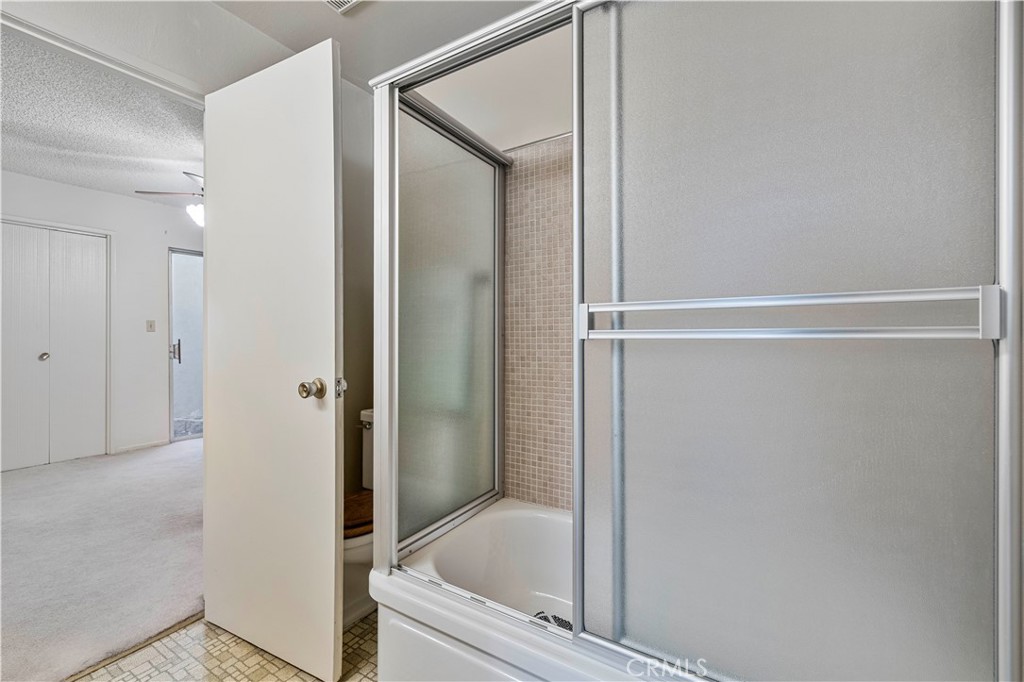 26838 C Ave Of The Oaks, Unit C Newhall, CA 91321 - Photo 20 of 34 a bathroom with a tub