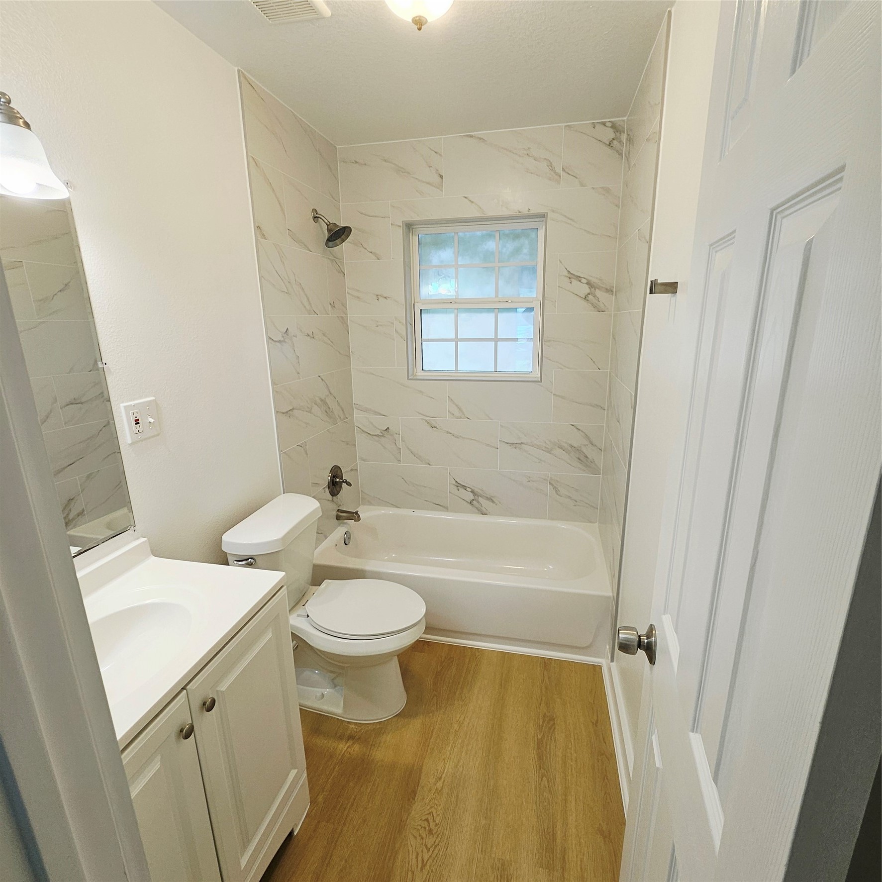 305 Miles Road Bacliff, TX 77518 - Photo 14 of 17 a bathroom with a sink a toilet and a bathtub