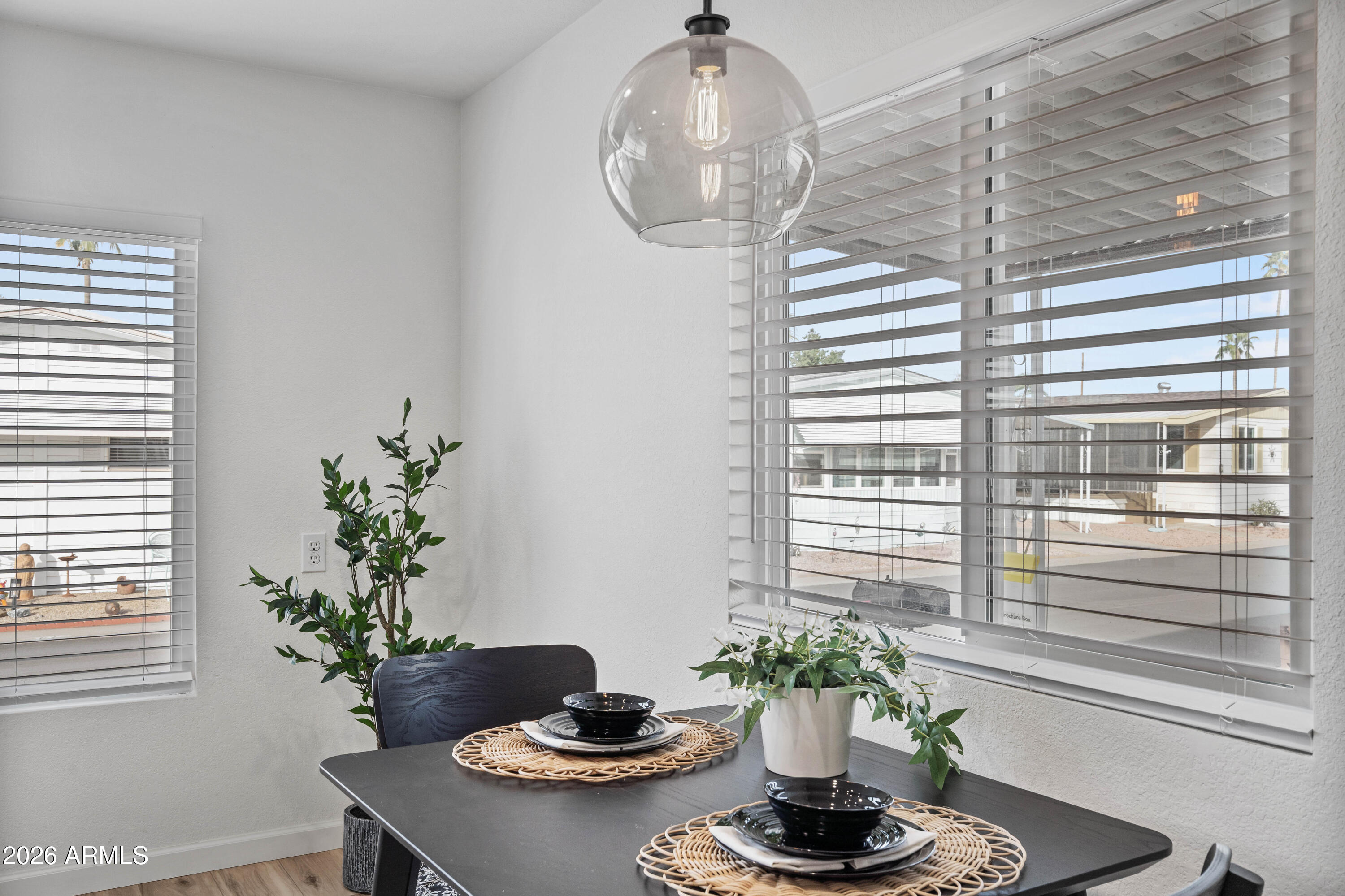 205 South Higley Road, Unit 52 Mesa, AZ 85206 - Photo 19 of 34 a vase of flowers sitting on a table