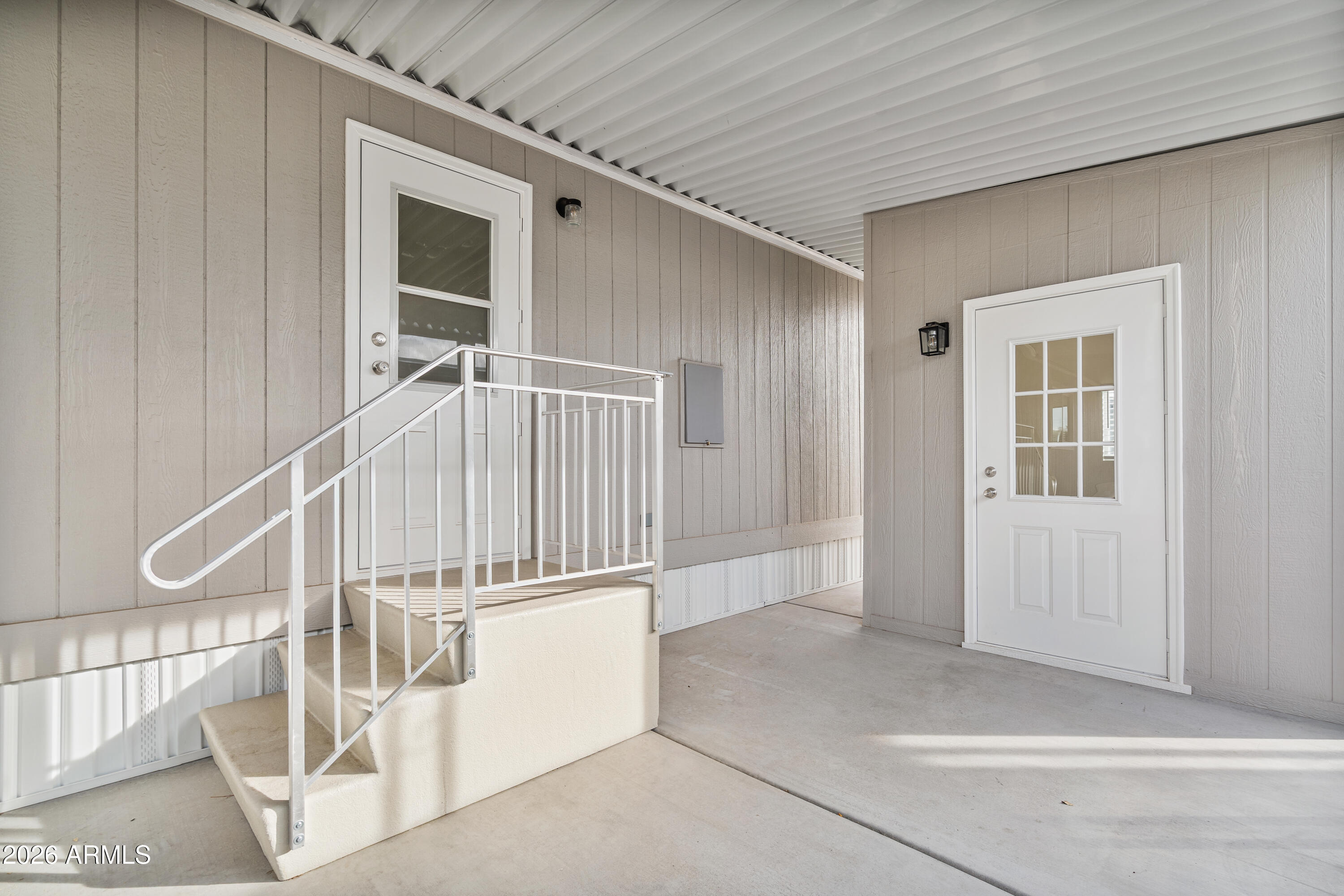 205 South Higley Road, Unit 52 Mesa, AZ 85206 - Photo 31 of 34 a view of entryway with wooden floor