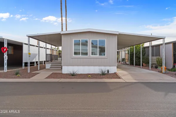 a front view of a house with a garage