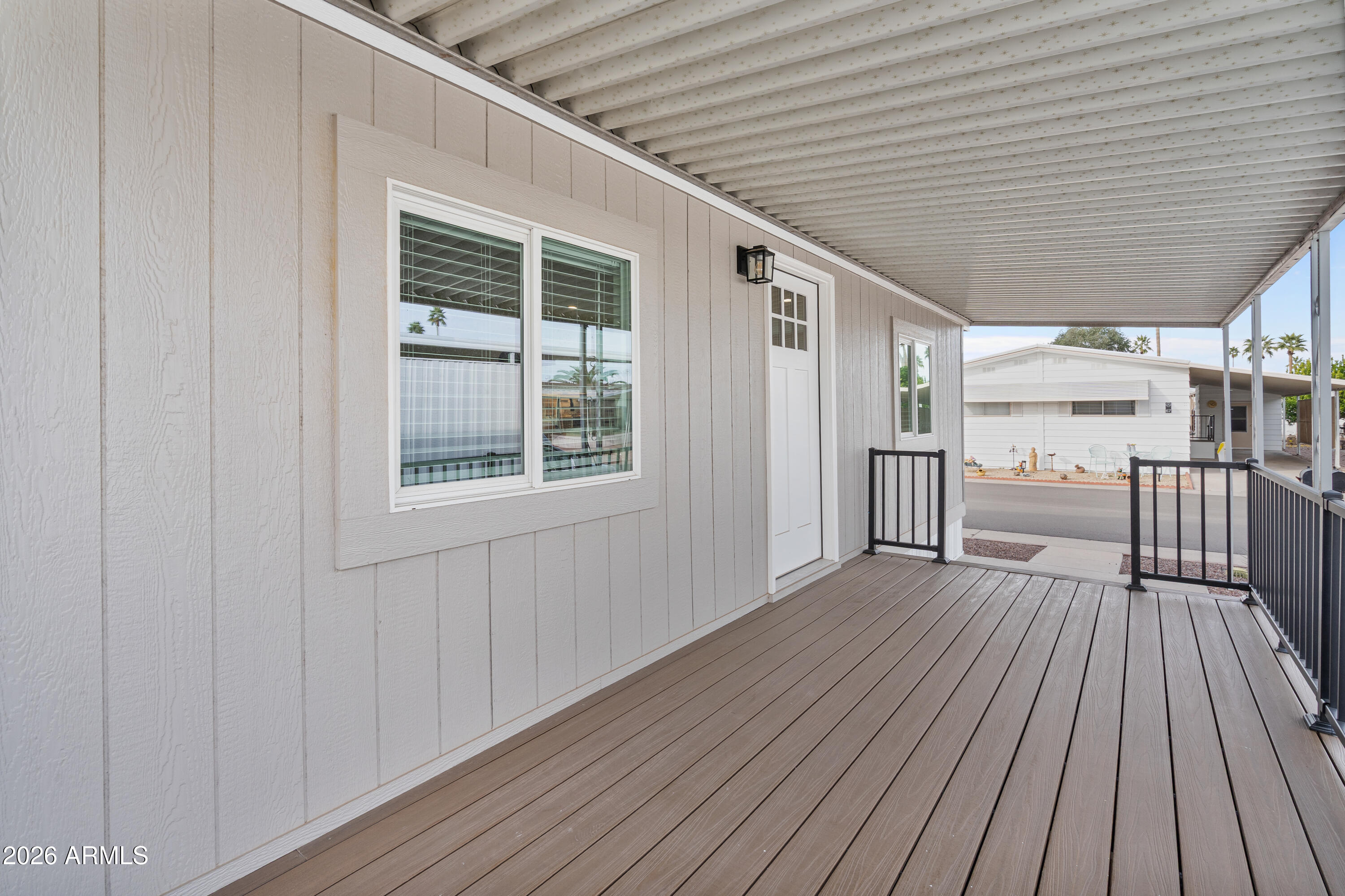 205 South Higley Road, Unit 52 Mesa, AZ 85206 - Photo 10 of 34 a view of wooden balcony