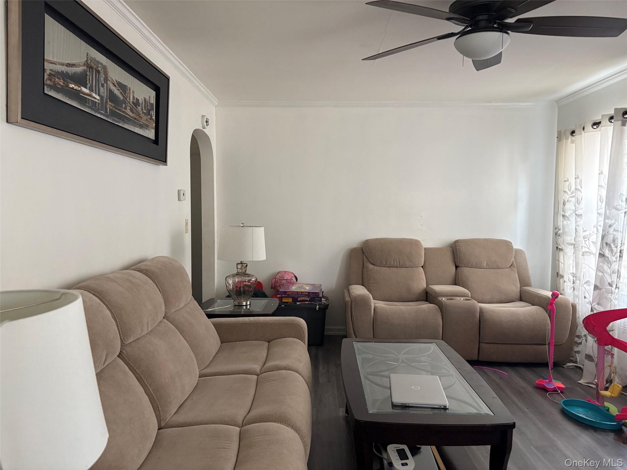 91 Broadway Valley Stream, NY 11580 - Photo 3 of 12 a living room with furniture and a window