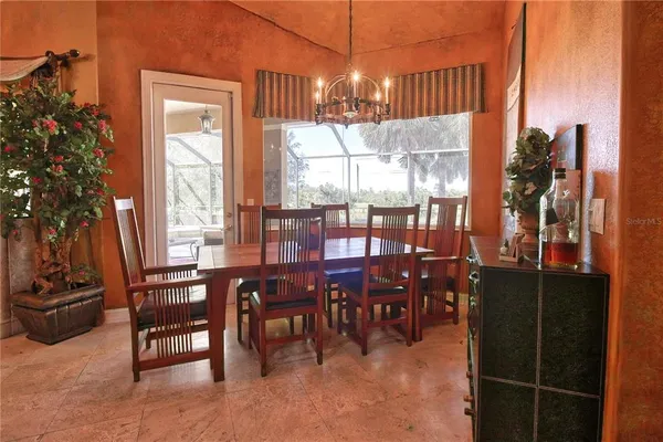 a living room with a couch and a window