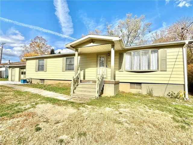 a house view with a outdoor space