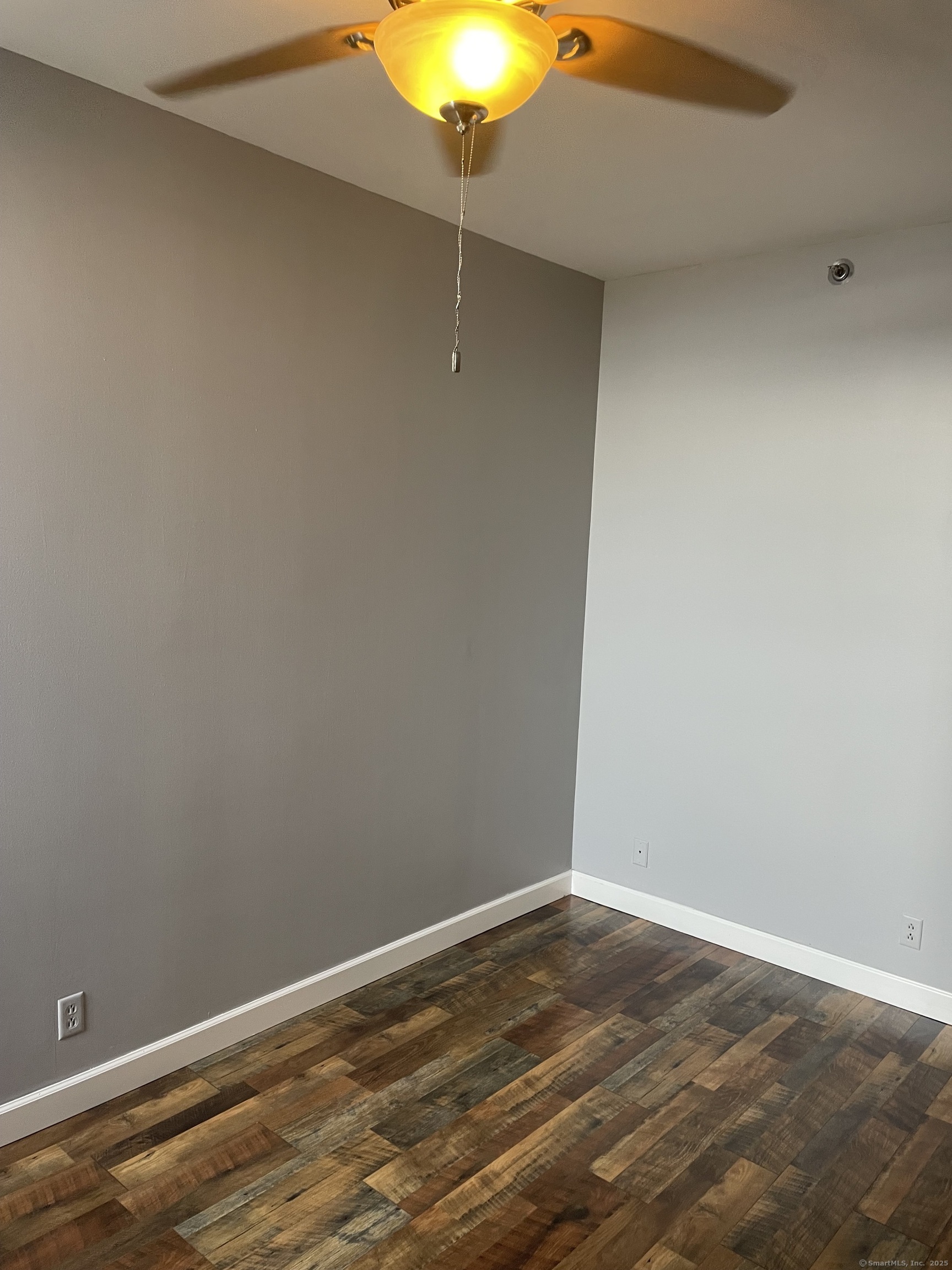 124 Court Street, Unit 1103 New Haven, CT 06511 - Photo 11 of 21 a view of a room with wooden floor