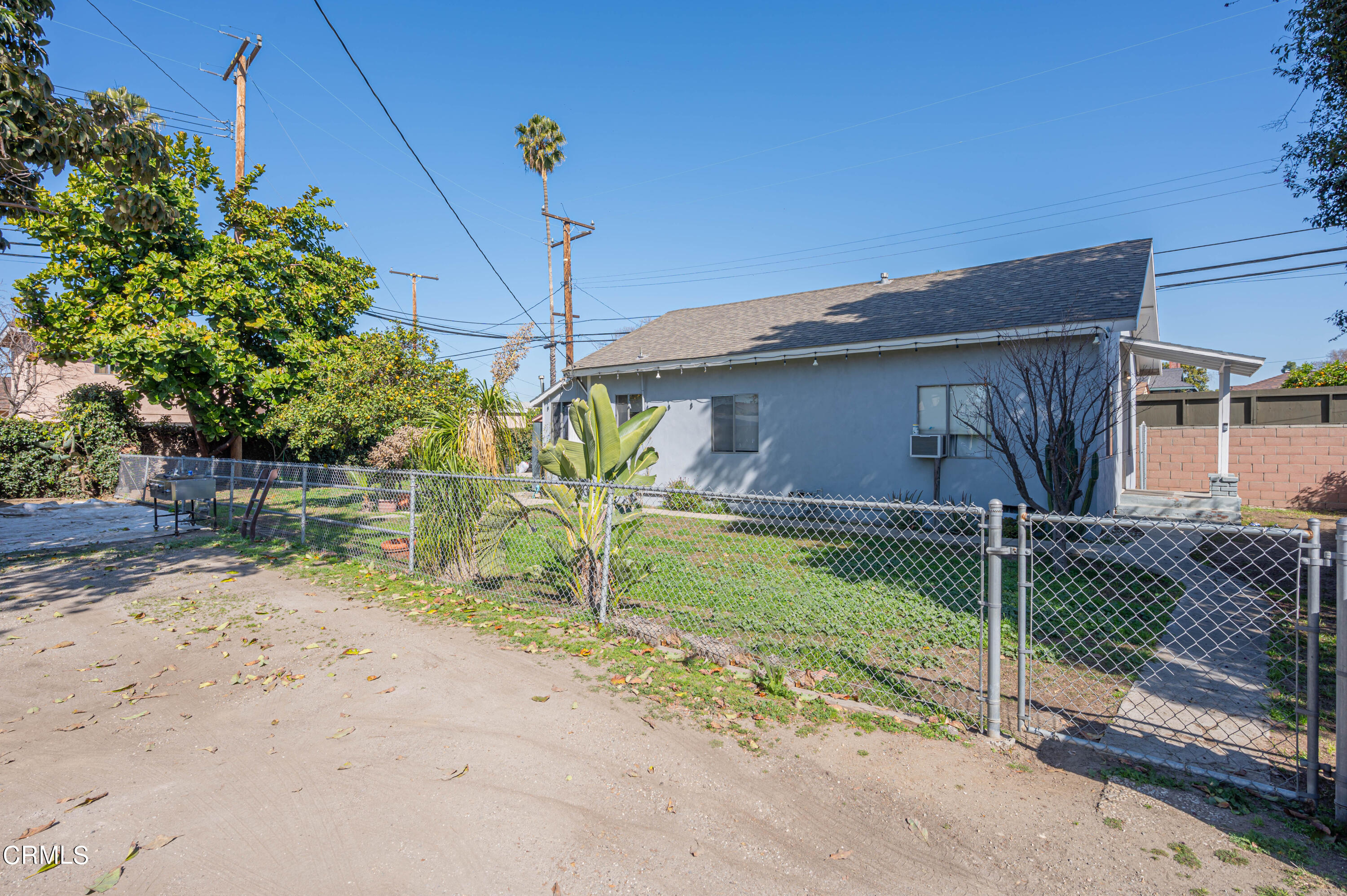 9911 Tweedy Lane Downey, CA 90240 - Photo 15 of 28 a house view with a backyard space