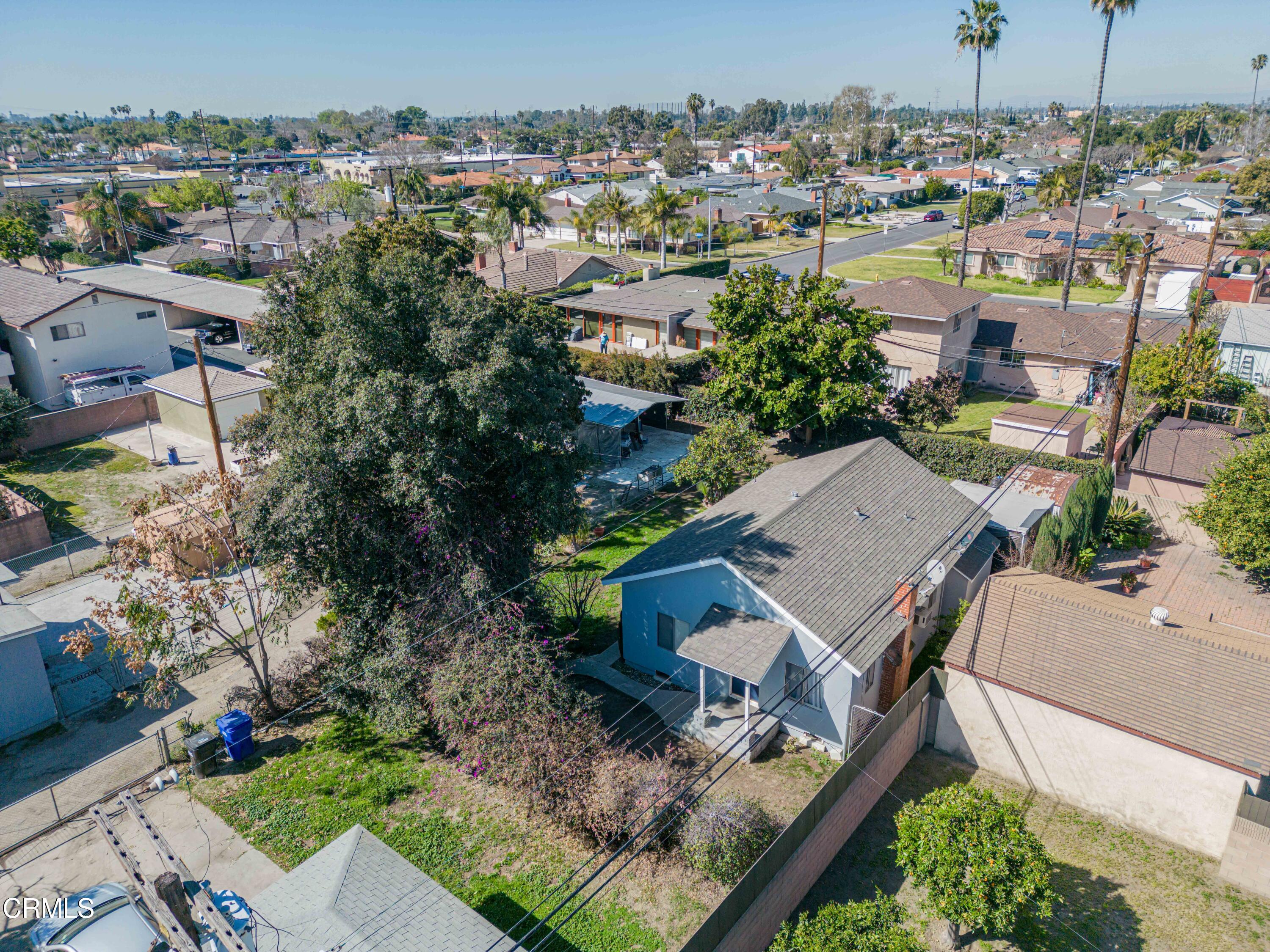 9911 Tweedy Lane Downey, CA 90240 - Photo 17 of 28 an aerial view of a house with a yard
