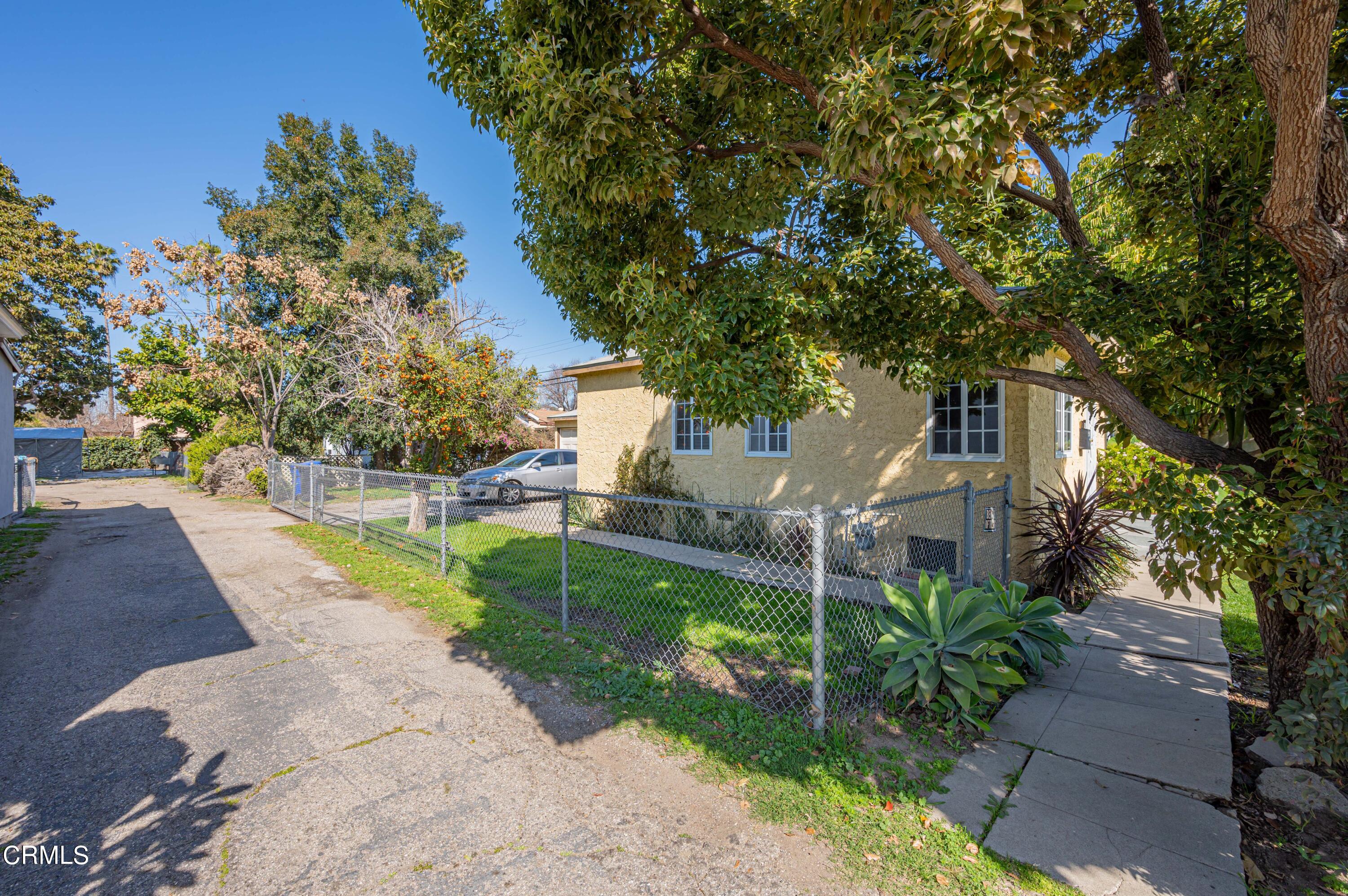 9911 Tweedy Lane Downey, CA 90240 - Photo 7 of 28 a view of a swimming pool with a patio