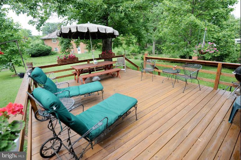 6505 Divine Street McLean, VA 22101 - Photo 15 of 26 a view of a roof deck with furniture