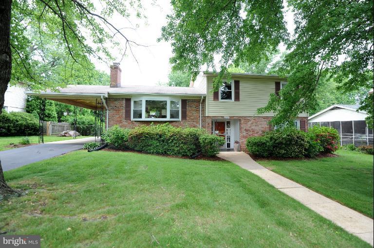 6505 Divine Street McLean, VA 22101 - Photo 26 of 26 a front view of a house with a yard