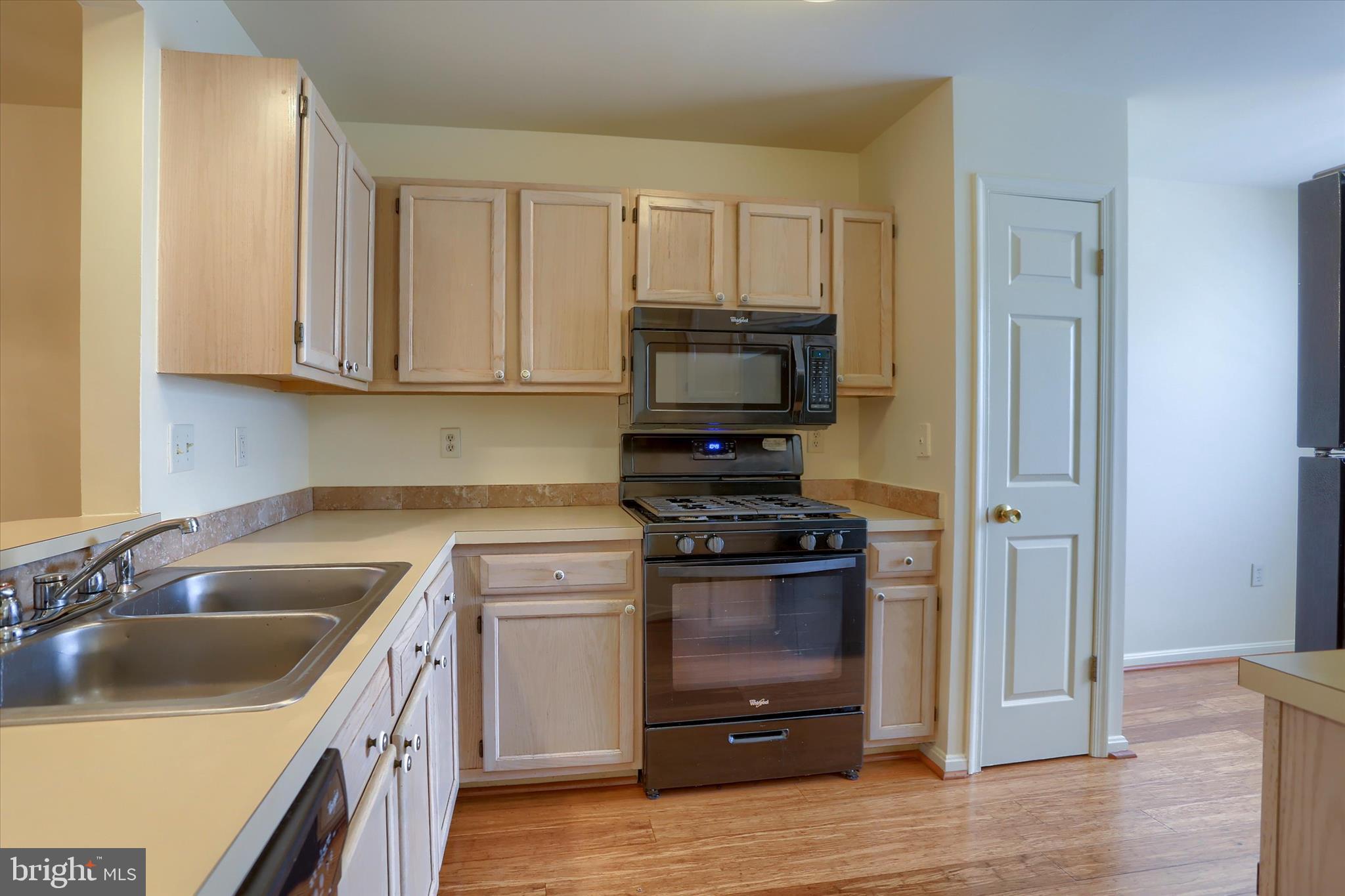 107 Fawn Ridge North Harrisburg, PA 17110 - Photo 11 of 40 a kitchen with a sink and a stove top oven
