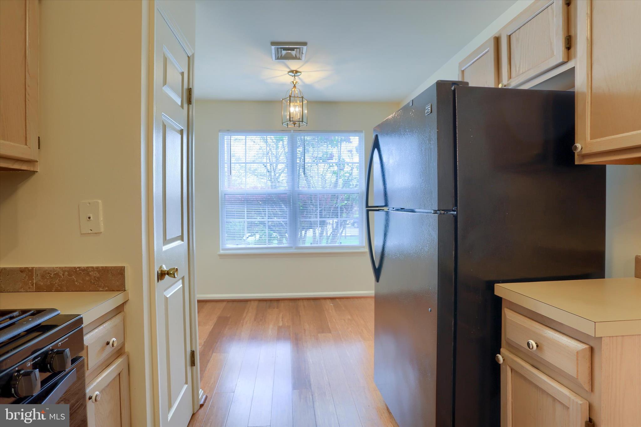 107 Fawn Ridge North Harrisburg, PA 17110 - Photo 13 of 40 a view of hallway with wooden floor and staircase