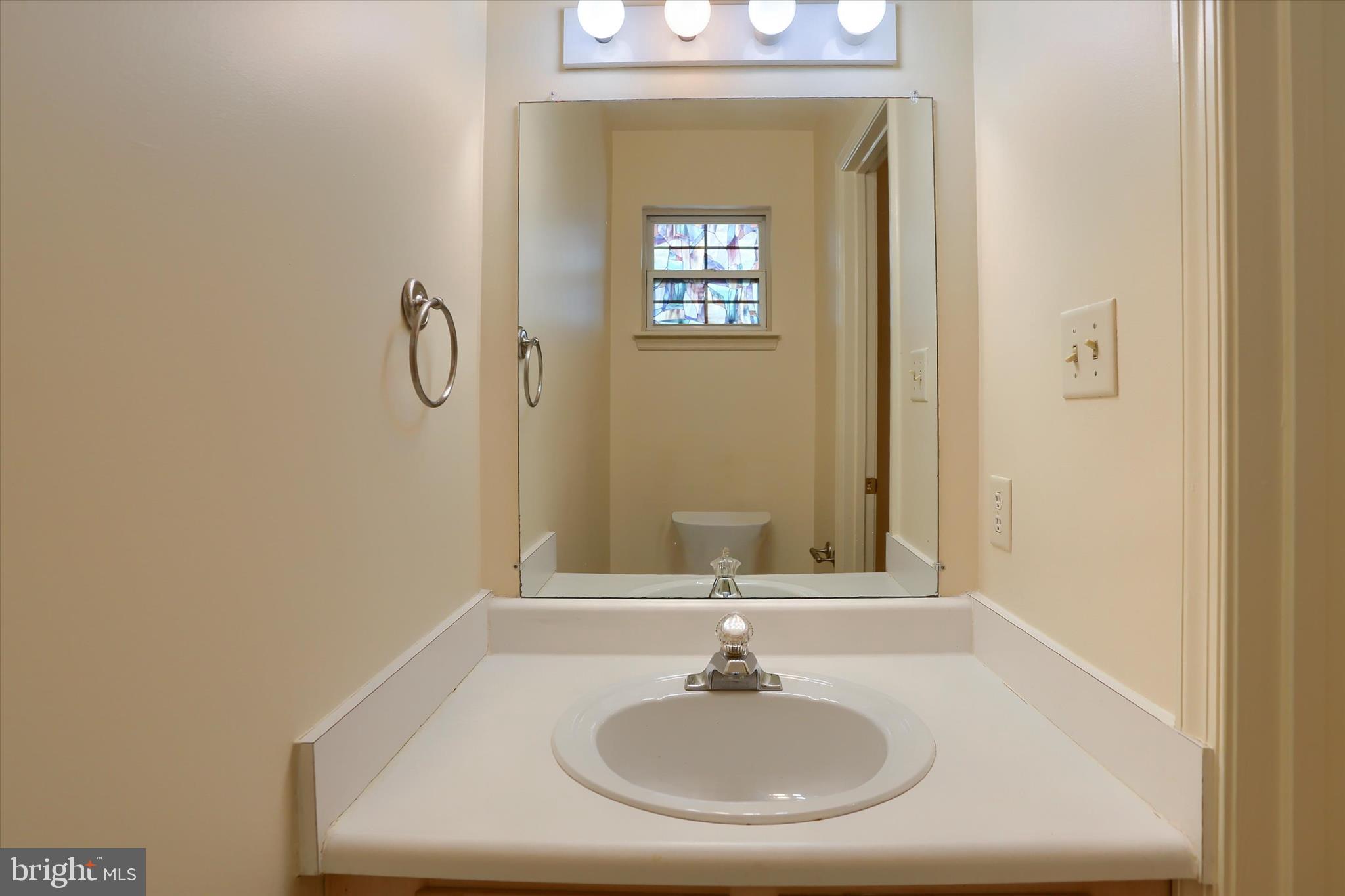 107 Fawn Ridge North Harrisburg, PA 17110 - Photo 19 of 40 a bathroom with a sink and a mirror