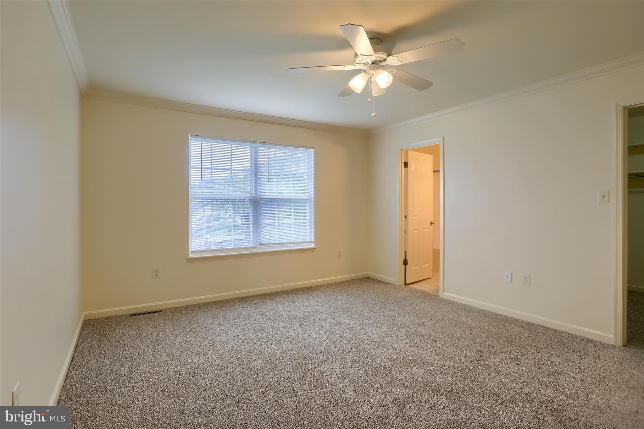 107 Fawn Ridge North Harrisburg, PA 17110 - Photo 22 of 40 an empty room with windows and fan