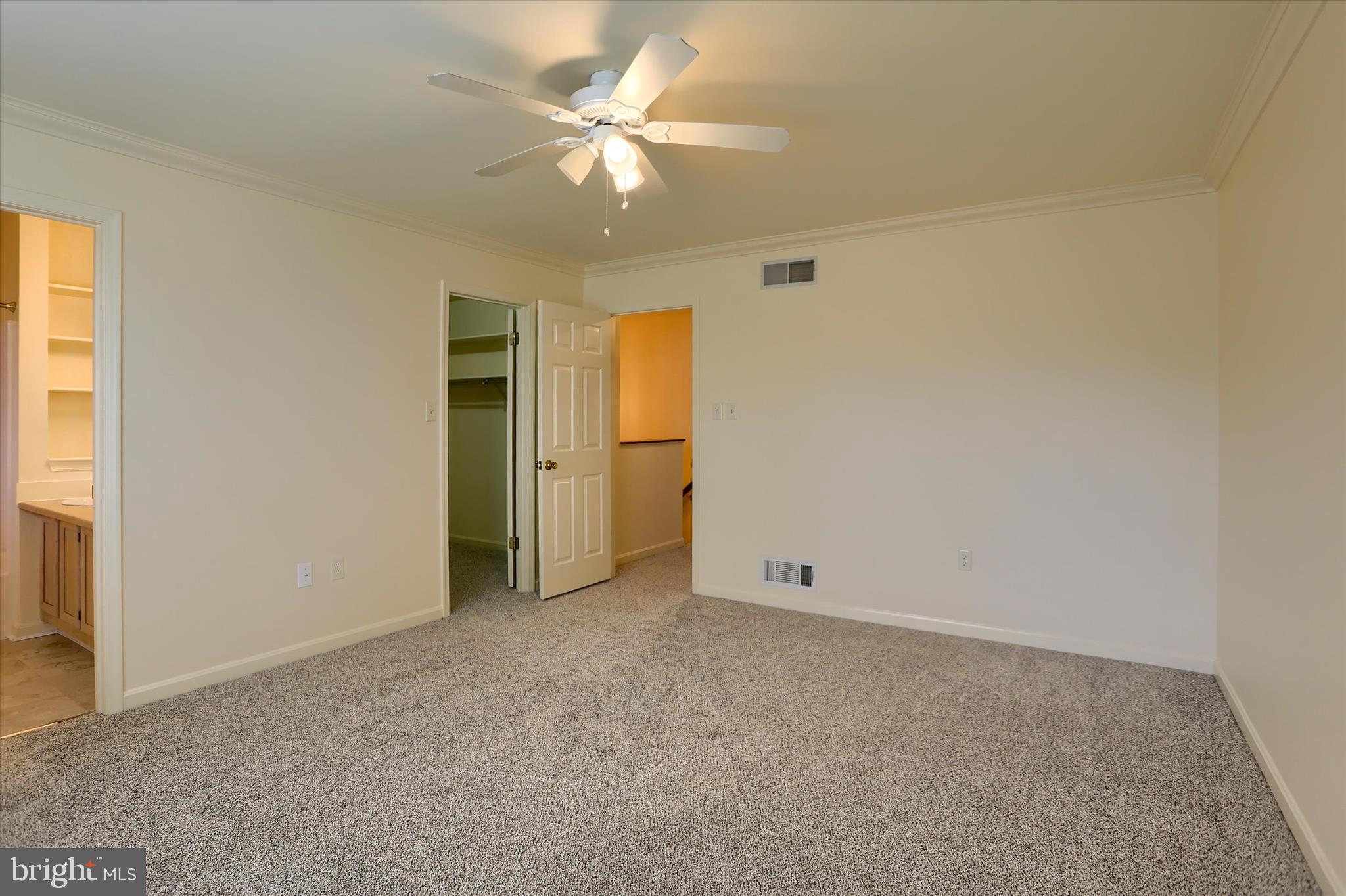 107 Fawn Ridge North Harrisburg, PA 17110 - Photo 23 of 40 an empty room with a ceiling fan and a window