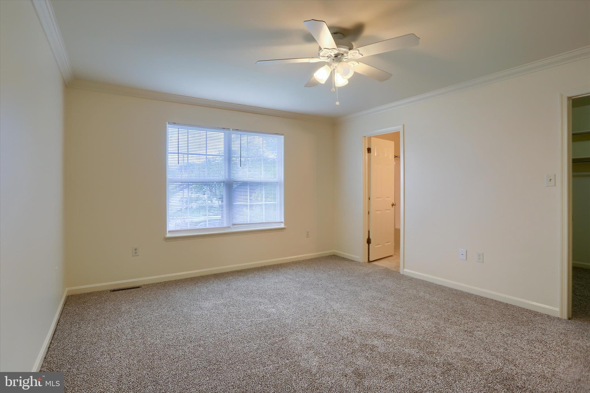 107 Fawn Ridge North Harrisburg, PA 17110 - Photo 26 of 40 an empty room with windows and fan