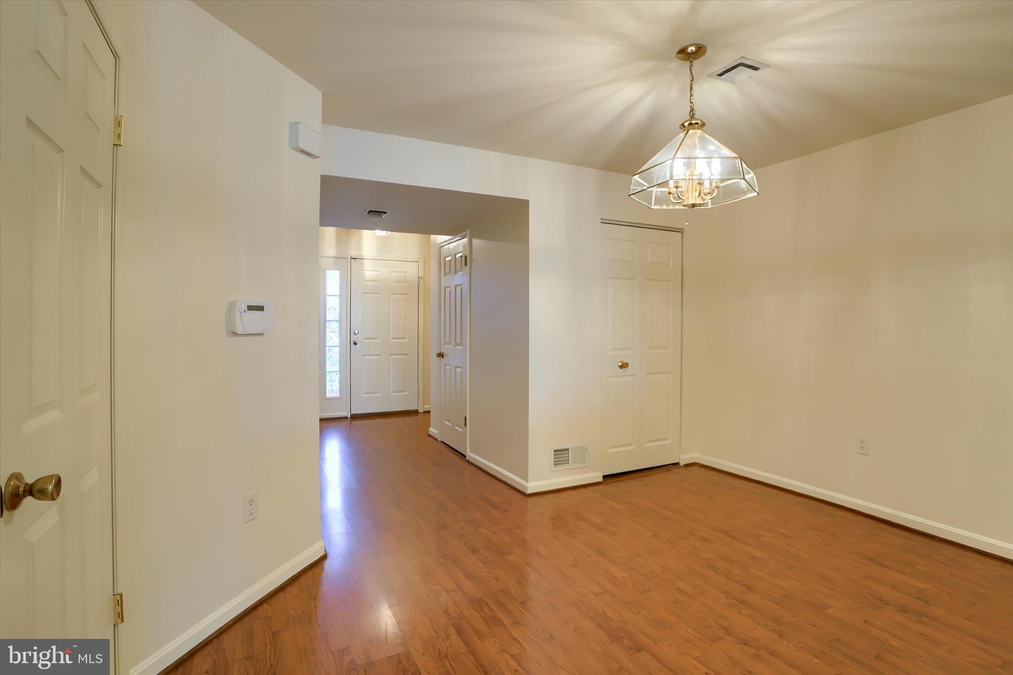 107 Fawn Ridge North Harrisburg, PA 17110 - Photo 6 of 40 wooden floor in an empty room with a window