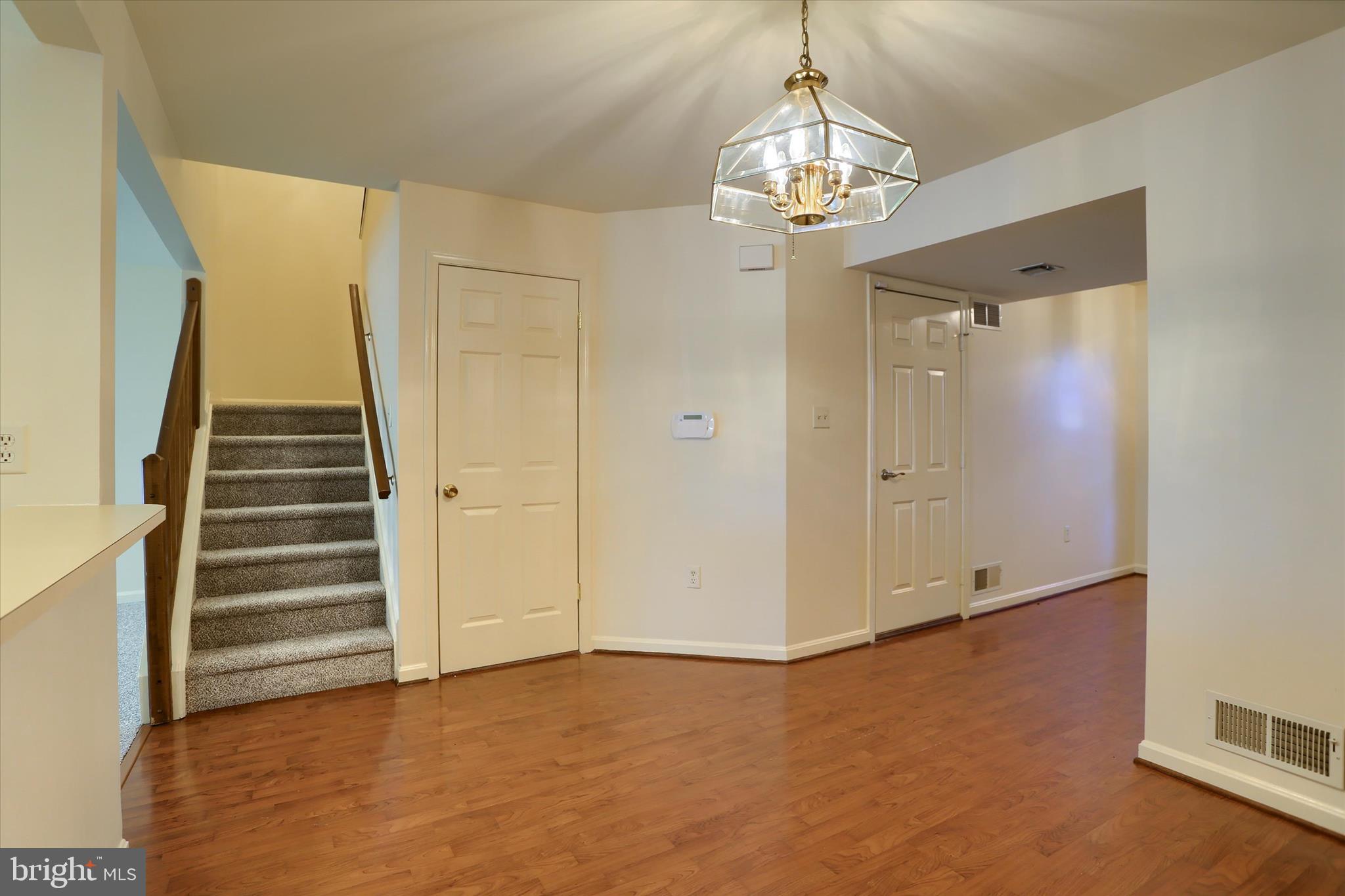 107 Fawn Ridge North Harrisburg, PA 17110 - Photo 7 of 40 a view of a hallway with a chandelier