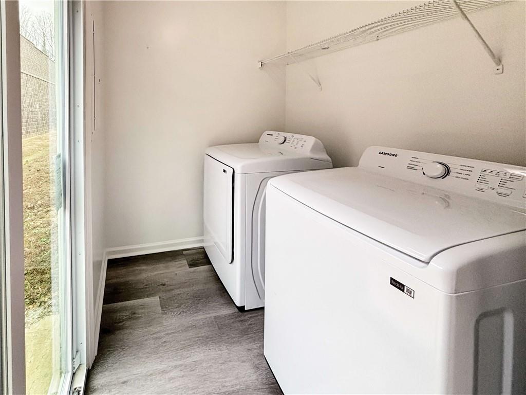1400 Stonehaven Circle, Unit 1402 Cartersville, GA 30121 - Photo 21 of 23 a utility room with dryer and washer