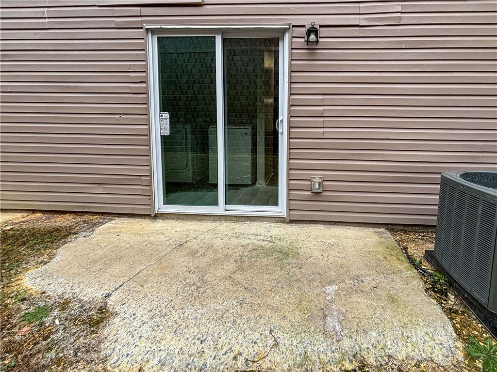 1400 Stonehaven Circle, Unit 1402 Cartersville, GA 30121 - Photo 22 of 23 a view of a backyard of a house