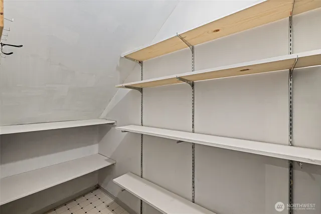 a view of an empty walk in closet