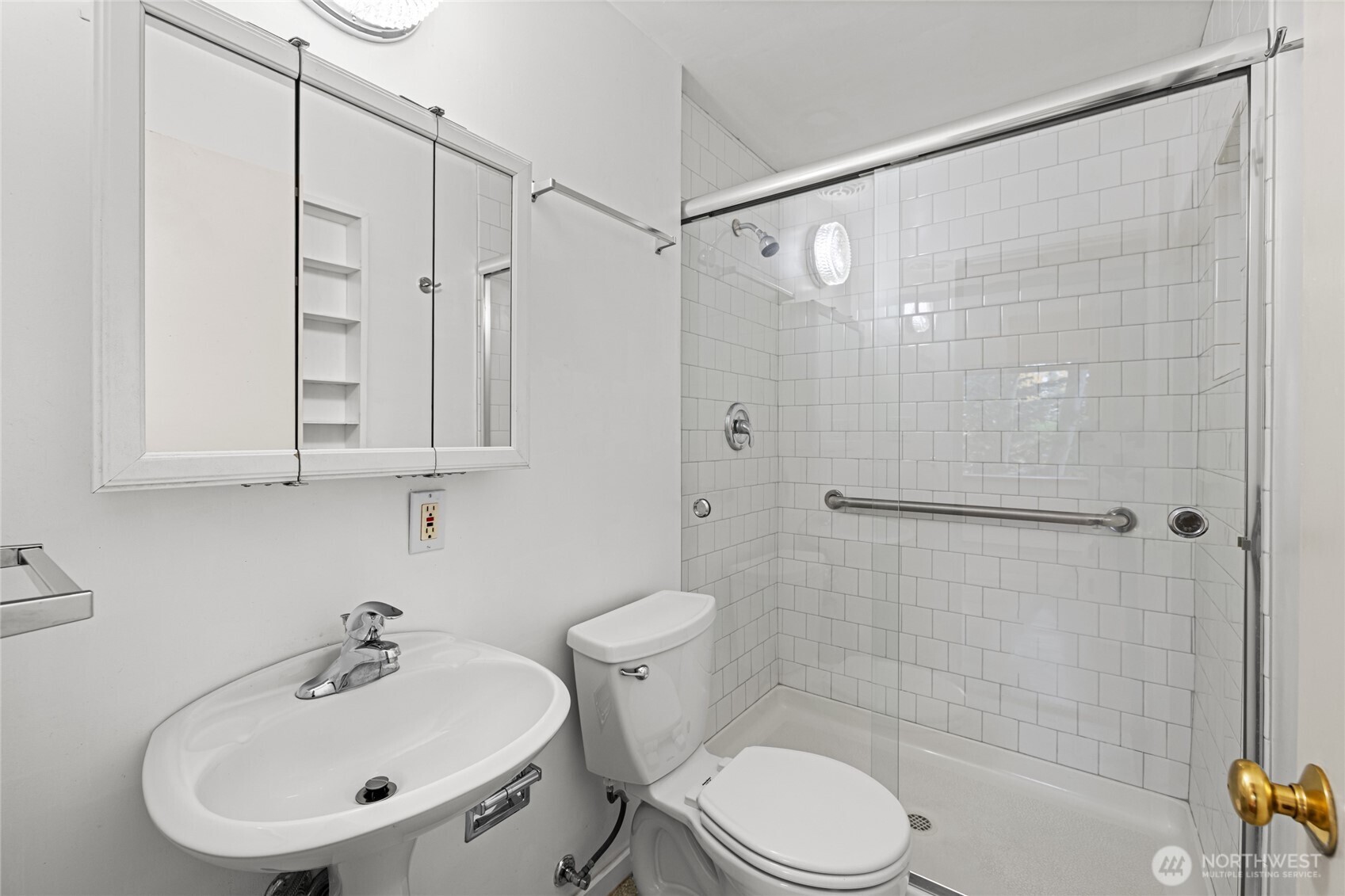 634 13th Avenue East, Unit 17 Seattle, WA 98102 - Photo 20 of 39 a bathroom with a sink toilet and shower