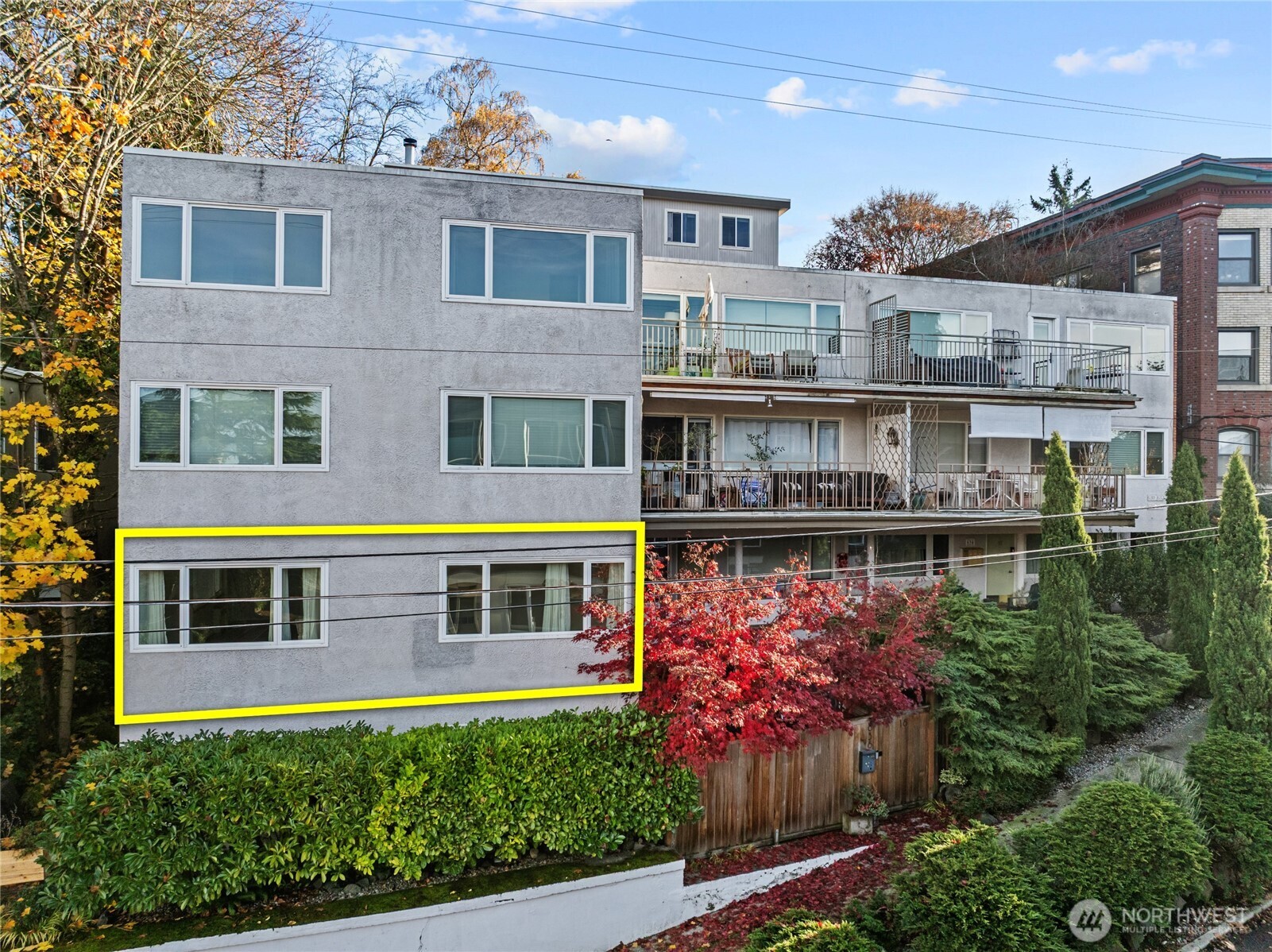 634 13th Avenue East, Unit 17 Seattle, WA 98102 - Photo 2 of 39 a view of a house with balcony