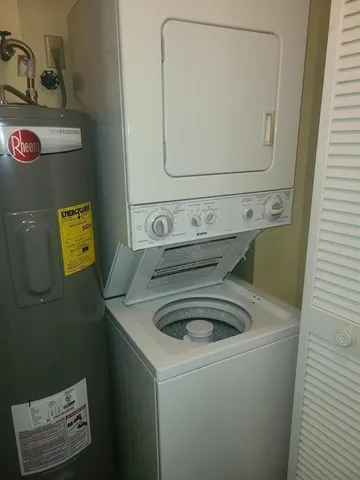 a view of a swimming pool with a patio and a garden