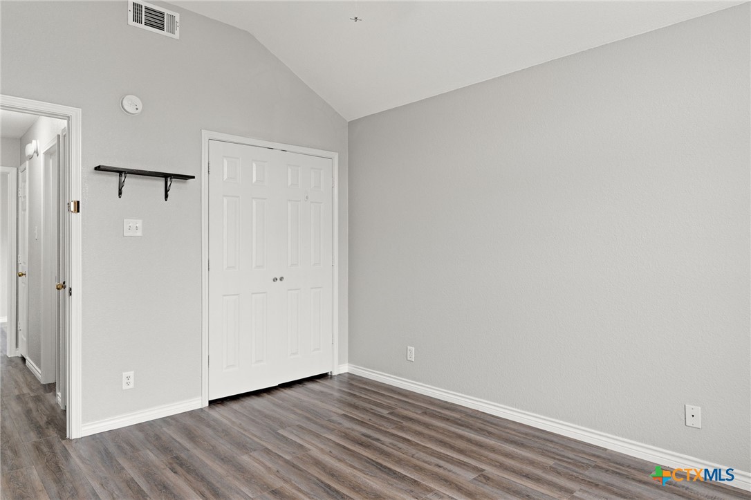 4305 Maggie Drive Killeen, TX 76549 - Photo 12 of 14 a view of an empty room with wooden floor