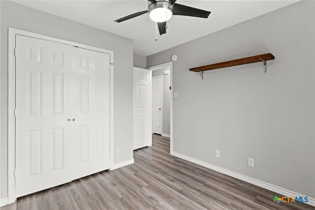 a view of a livingroom with wooden floor