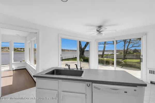 a kitchen with a sink and a window
