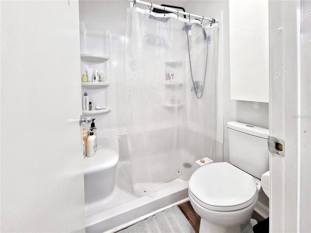 2601 Southwest Archer Road, Unit H330 Gainesville, FL 32608 - Photo 16 of 28 a bathroom with a sink and a mirror