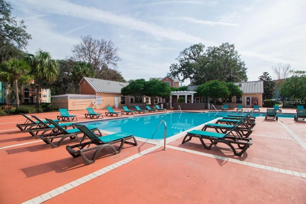 2601 Southwest Archer Road, Unit H330 Gainesville, FL 32608 - Photo 25 of 28 an outdoor space with patio furniture and garden