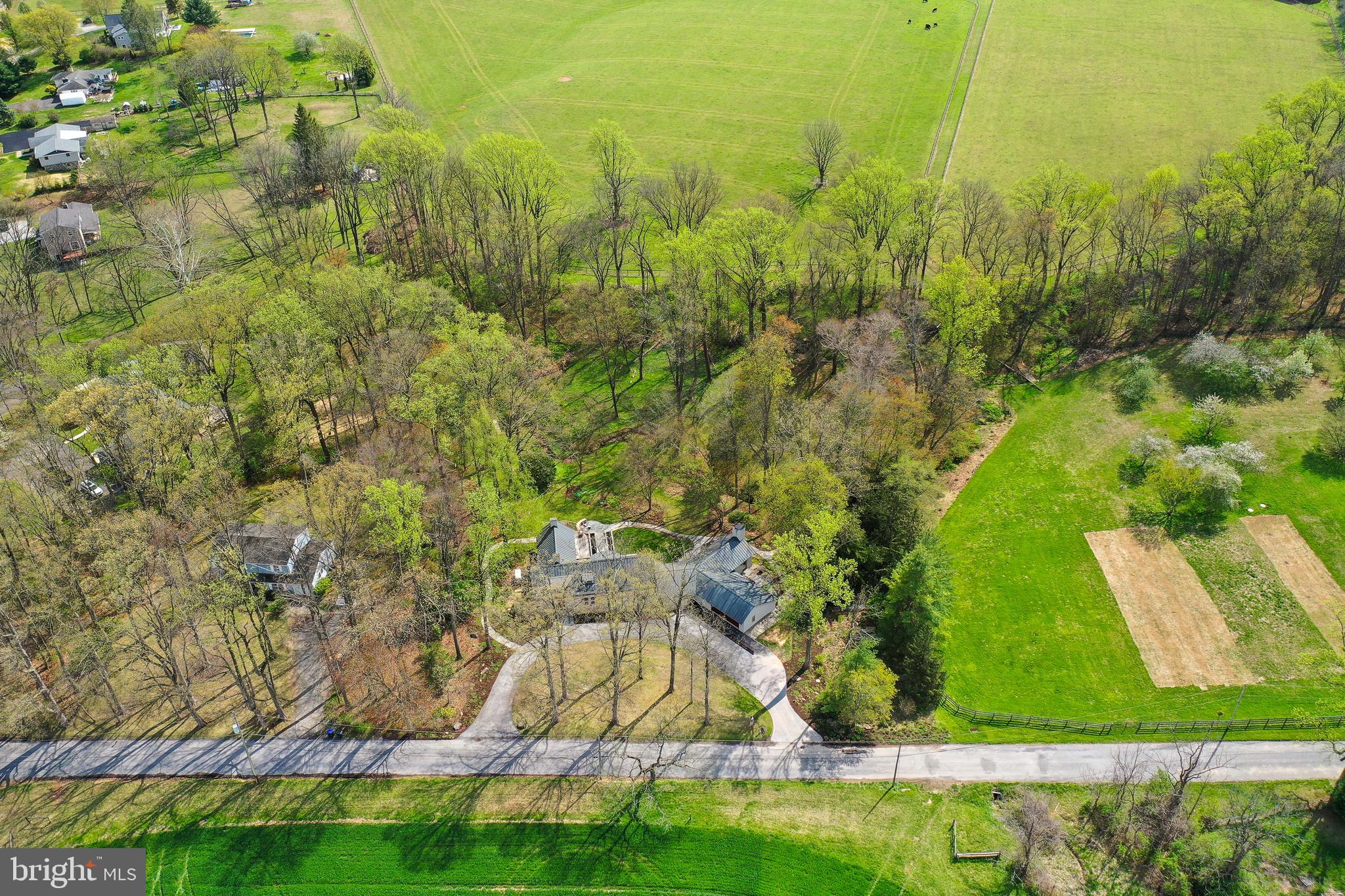 1205 Scott Road Kennett Square, PA 19348 - Photo 58 of 60 an aerial view of residential houses with outdoor space and trees