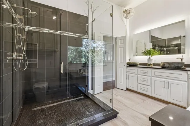 a view of a chairs and tables in the patio