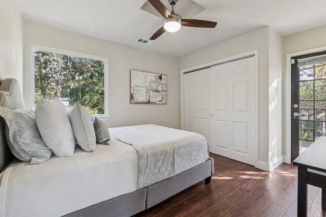 a view of a patio with a table and chairs