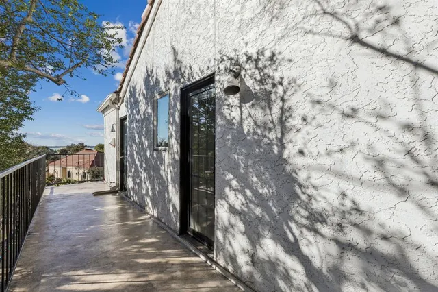 an aerial view of a house with a garden