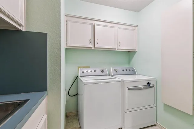 an aerial view of a house with a lake view