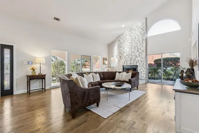 a kitchen with a sink a counter top stainless steel appliances and cabinets