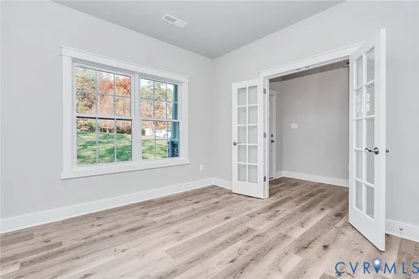 a kitchen with stainless steel appliances granite countertop a refrigerator stove microwave and sink