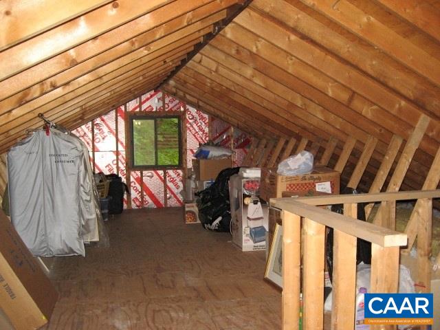 25 Dogleg Road Palmyra, VA 22963 - Photo 13 of 20 Stairs lead to an abundance of storage in the easily accessible walk-up attic.