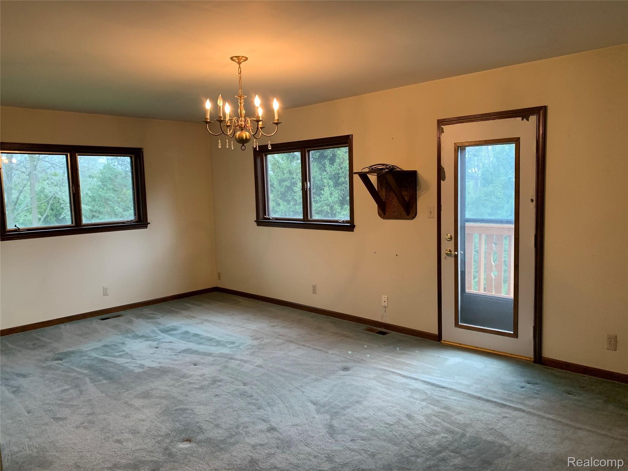 812 North Hacker Road Howell, MI 48843 - Photo 16 of 27 master bedroom