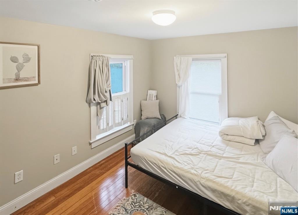68 Washington Avenue Rutherford, NJ 07070 - Photo 16 of 23 a bedroom with a bed and a window