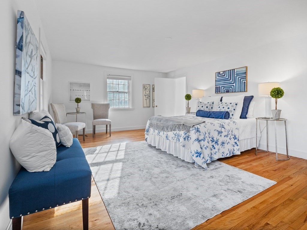 31 Bay State Road Wellesley, MA 02481 - Photo 13 of 24 a living room with furniture and a lamp