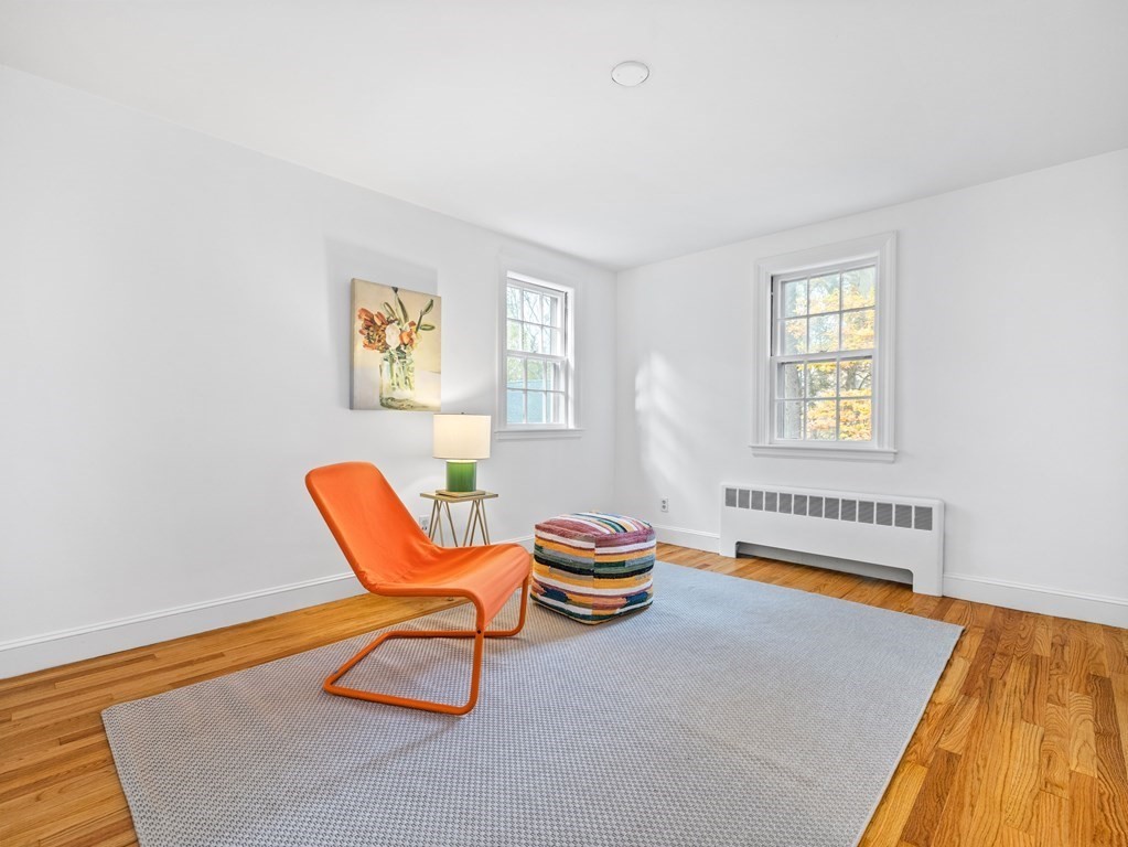 31 Bay State Road Wellesley, MA 02481 - Photo 17 of 24 a living room with furniture and a table